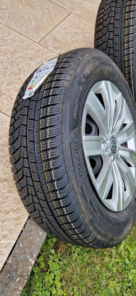 Neue Reifen auf Winterkompletträder VW Tiguan 215/65 R17 99H in Kehl