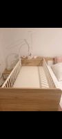 Babybett mit dazugehörigen Seitenteilen Hessen - Bruchköbel Vorschau
