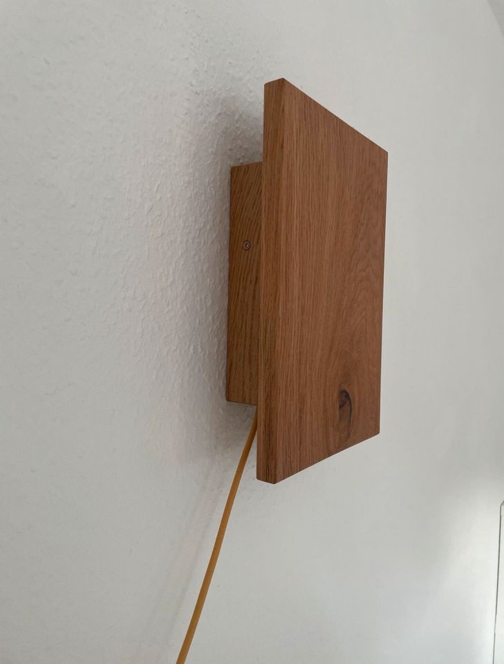 Wandlampe aus Holz in Ellerau 