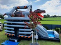 XXL Hüpfburg Multiplay Super Rex zu vermieten 13x5 Meter. Bayern - Goldbach Vorschau