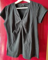 40 42 H&M T-Shirt schwarz V-Ausschnitt Knopfleiste Stretch Berlin - Treptow Vorschau