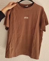 Braunes H&M T-Shirt mit weißen Print  - Größe M Duisburg - Rumeln-Kaldenhausen Vorschau