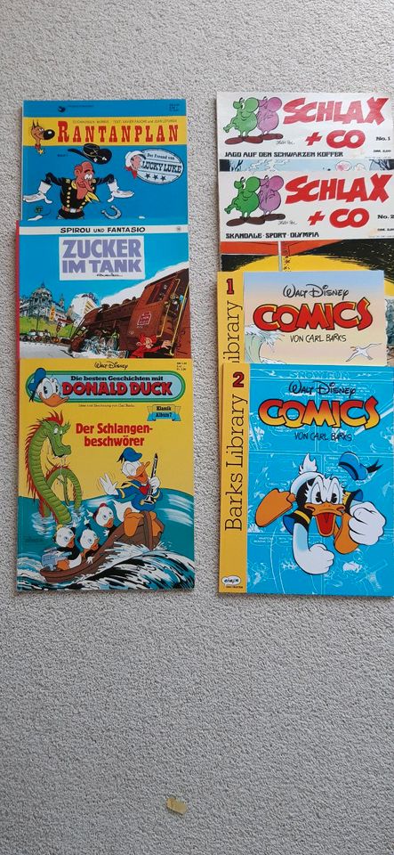 7 verschiedene Comics:Spirou,Rantanplan,Donald Duck,Barks,Schlax+ in Idstein