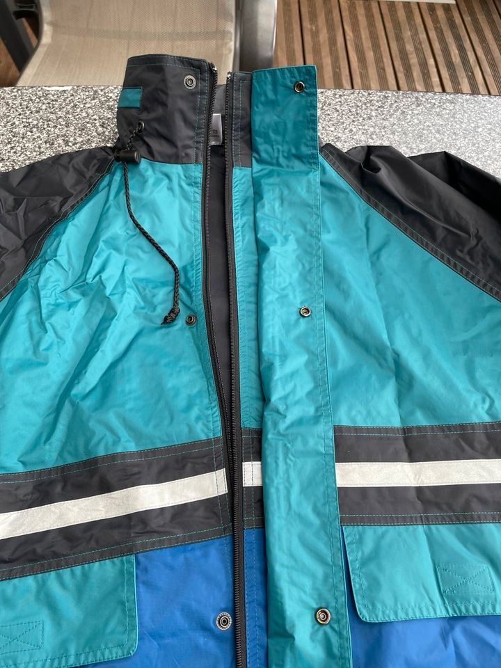 Regenjacke S M mit verdeckter Kapuze jugendliche Damen Herren in Willich