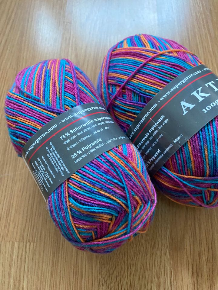 Aktiv Sockenwolle, pink orange blau, 75% Wolle, 3,5 Knäuel a 100g in Bonn