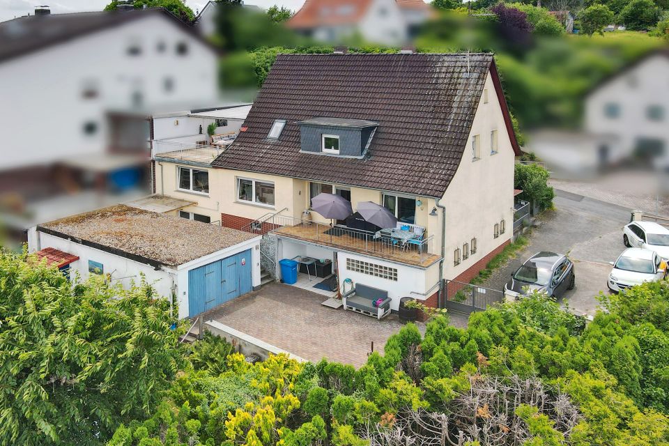 Interessantes Einfamilienhaus mit Einliegerwohnung und wunderschönem, unverbaubarem Fernblick in Roßdorf