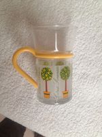 Glas Teeglas mit Motiv und farbigem Griff Hessen - Hammersbach Vorschau