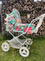 Nostalgischer Kinderwagen mit fröhlich buntem Blumenmuster Baden-Württemberg - Nattheim Vorschau