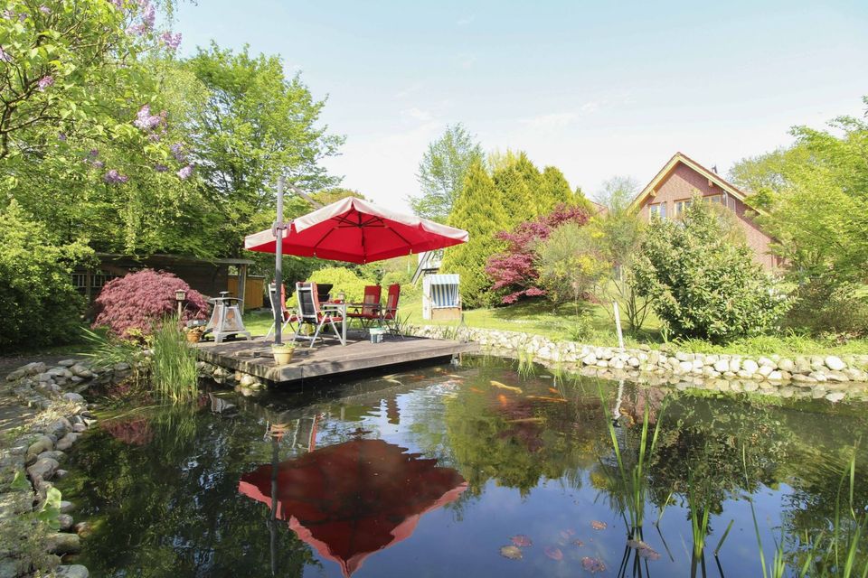 Moderne Ruheoase lädt zum Bleiben ein: 5-Zi.-Zuhause mit Garten und Doppelgarage in Basdahl