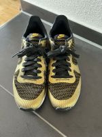 Nike Damenschuh Gr. 36,5 in Gold Bayern - Regensburg Vorschau