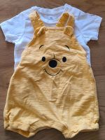 Kurze Latzhose Winnie Puuh mit T-Shirt Gr. 68 Bayern - Niederviehbach Vorschau