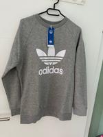 Adidas Adicolor Sweatshirt Pullover grau M  NEU hellgrau Sweater Nordrhein-Westfalen - Brilon Vorschau