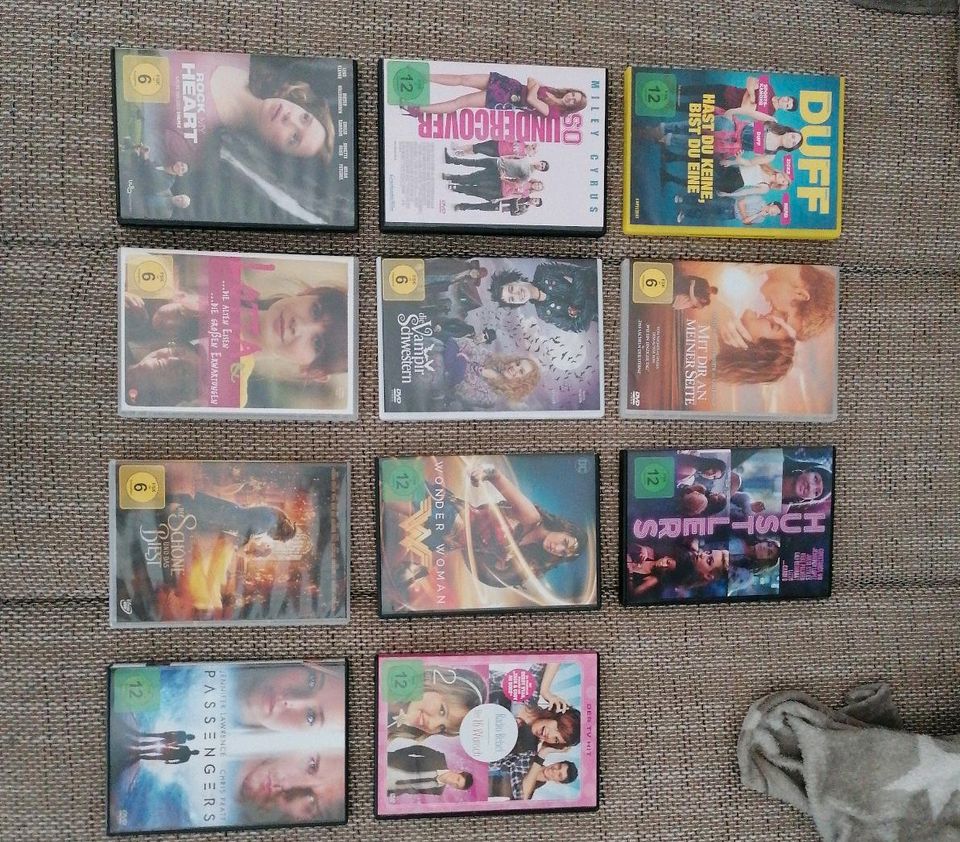 11 verschiedene DVDs in Stockelsdorf