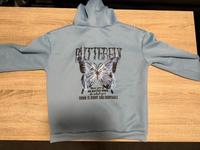 Blauer Pullover mit Schmetterling Motiv Flensburg - Mürwik Vorschau
