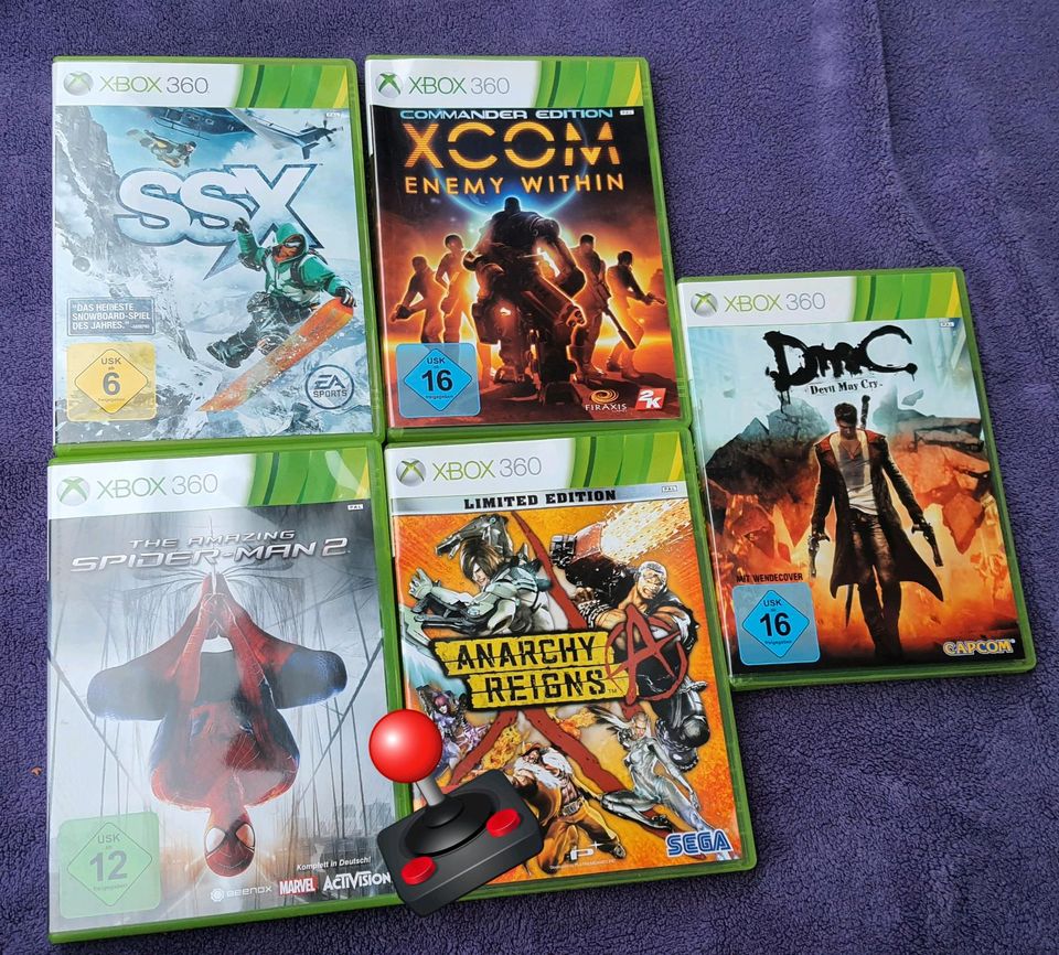 Xbox 360 spiele konvult ssx, spiderman 2, xcom, dmc in Marl