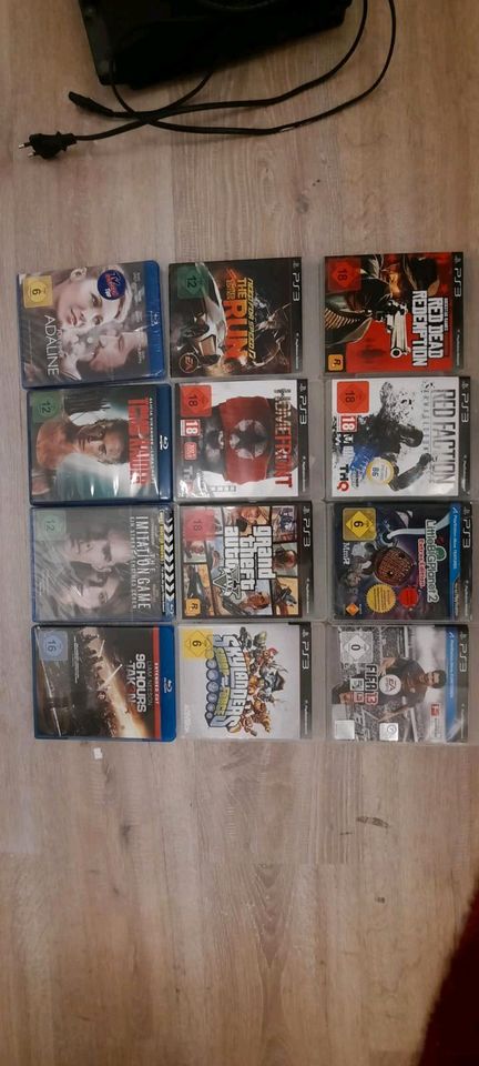Playstation 3 mit 8 Spielen und 4 Filme in Hahnstätten