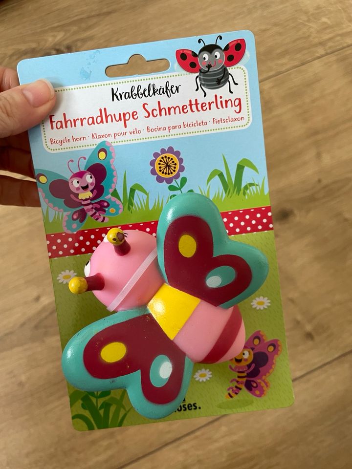 Krabbelkäfer Fahrradhupe Schmetterling