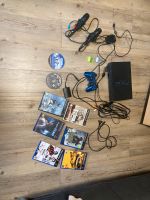 PlayStation 2 mit Spielen Mikrofonen und diversem Zubehör Schleswig-Holstein - Gremersdorf Vorschau