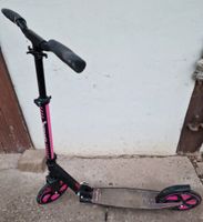 Roller schwarz/pink 215 Thüringen - Straußfurt Vorschau