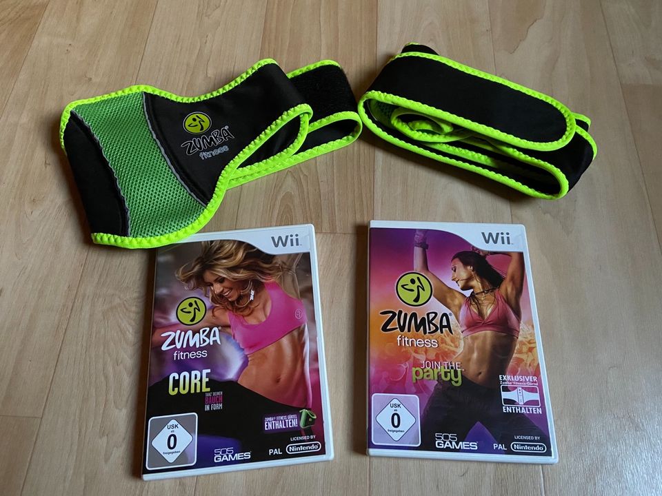 2 Nintendo Wii Spiele Zumba Fitness (inkl. Fitnessgürtel) in Biedenkopf