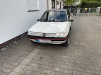 Peugeot 205 cj cabrio H Zulassung Hessen - Offenbach Vorschau