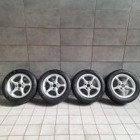 Vier BMW Original-Felgen Typ 102 mit Winterreifen 225/50 R 16 H Nordrhein-Westfalen - Leverkusen Vorschau