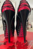 Pleaser High Heels Plateau Gr 40 Korsage rot/schwarz Baden-Württemberg - Mühlhausen Vorschau