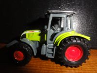 Siku Claas  1008 Trecker ca. 7 x 5 x 4 cm Schleswig-Holstein - Trappenkamp Vorschau