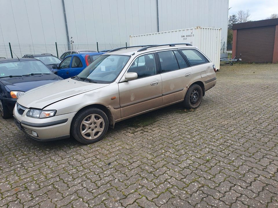 Mazda 626 Schlachtfest Ersatzteile Einzelteile Grau Bj.1998 in Bremervörde