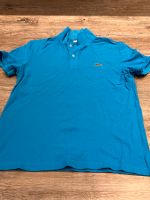 4 Poloshirts Tommy Hilfiger, Lacoste mit Möngeln L/M Nordrhein-Westfalen - Herford Vorschau