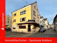 Vielseitige Kapitalanlage: Mehrfamilienhaus mit vier Wohneinheiten und Ladenlokal in zentraler Lage! Rheinland-Pfalz - Lahnstein Vorschau