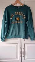 grüner Pullover "Los Angeles" Hessen - Gießen Vorschau