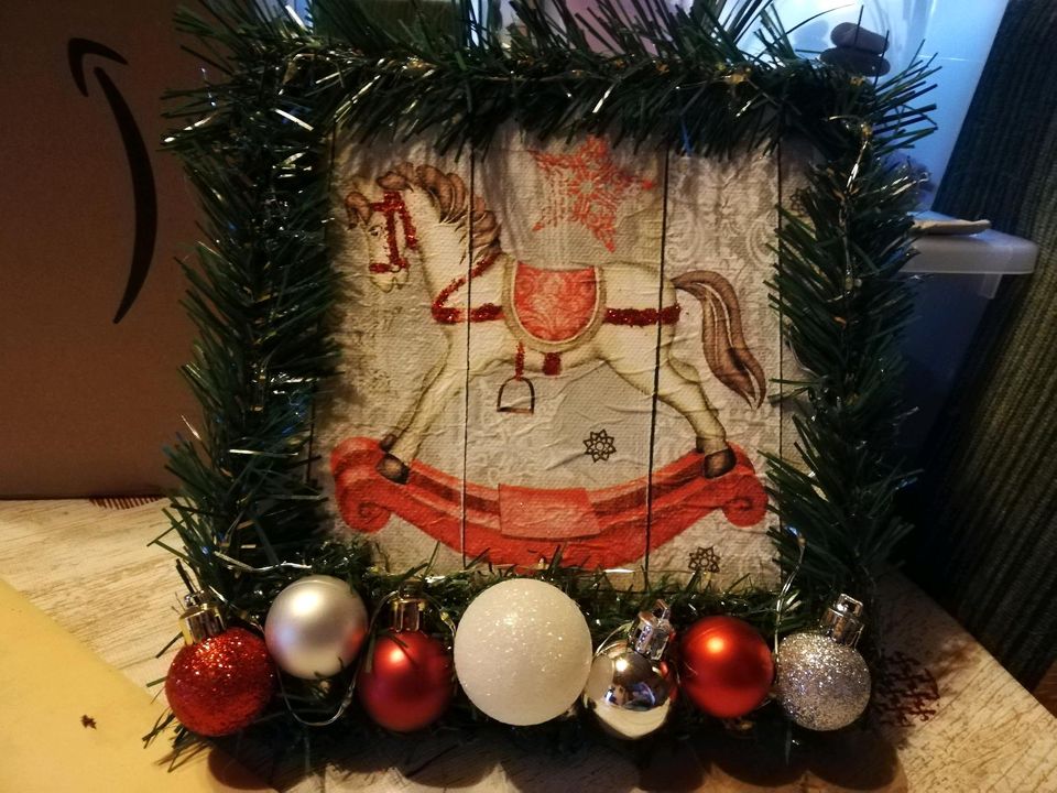 Weihnachtsbild Schaukelpferd nostalgisch mit Licht in Salem (Lauenburg)