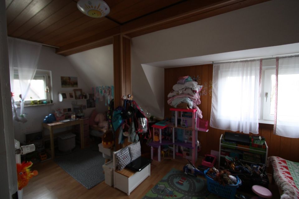 Individuell zu erweiternde Doppelhaushälfte mit Anbau und Investitionspotential, Dachterrasse und Garage in ruhiger Wohnlage von Neuwied-Engers in Neuwied