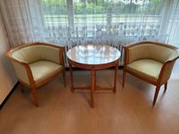 2 bequeme grüne Retro Sessel mit passenden Tisch aus Holz München - Schwabing-West Vorschau