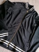 WARP TRAININGSJACKE GR. 146 152 JACKE SCHWARZ GOLD 146-152 Wuppertal - Ronsdorf Vorschau