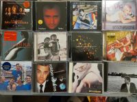 Diverse CDs Robbie Williams, Rihanna, Springsteen, Aerosmith Rheinland-Pfalz - Fachingen Vorschau