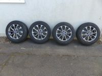 Mazda 3 Alufelgen dkl. grau metallic 205/60R16 Niedersachsen - Schneverdingen Vorschau