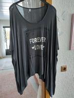 Shirt Zipfelshirt Größe 52/54 schwarz silber Toppzustand Niedersachsen - Bad Harzburg Vorschau