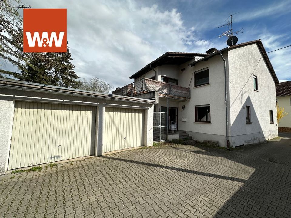 Zweifamilienhaus mit Garagen und Terrasse im schönen Dienheim. in Dienheim