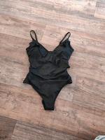 *H&M* Shape Badeanzug "M-38/40" schwarz mit Volants Brandenburg - Hoppegarten Vorschau