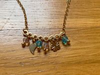 Goldfarbene Halskette Ohrringe Blumen, blau lila Perlen Kette neu Rheinland-Pfalz - Duchroth Vorschau