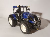 New Holland T8.390 Modell 1:16 Metallbausatz Maßstab Bruder, Ertl Hessen - Sontra Vorschau