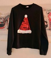 schwarzer Pulli H&M 164 170 Weihnachten Wendepailetten Baden-Württemberg - Keltern Vorschau