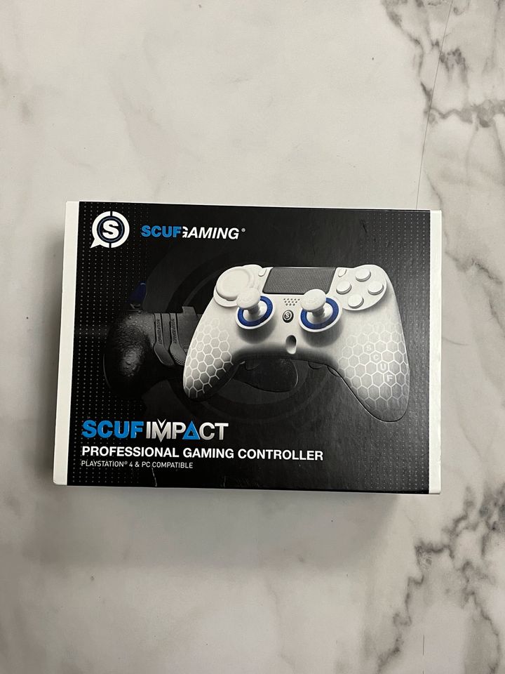 Scuf Impact gaming controller in Blaustein