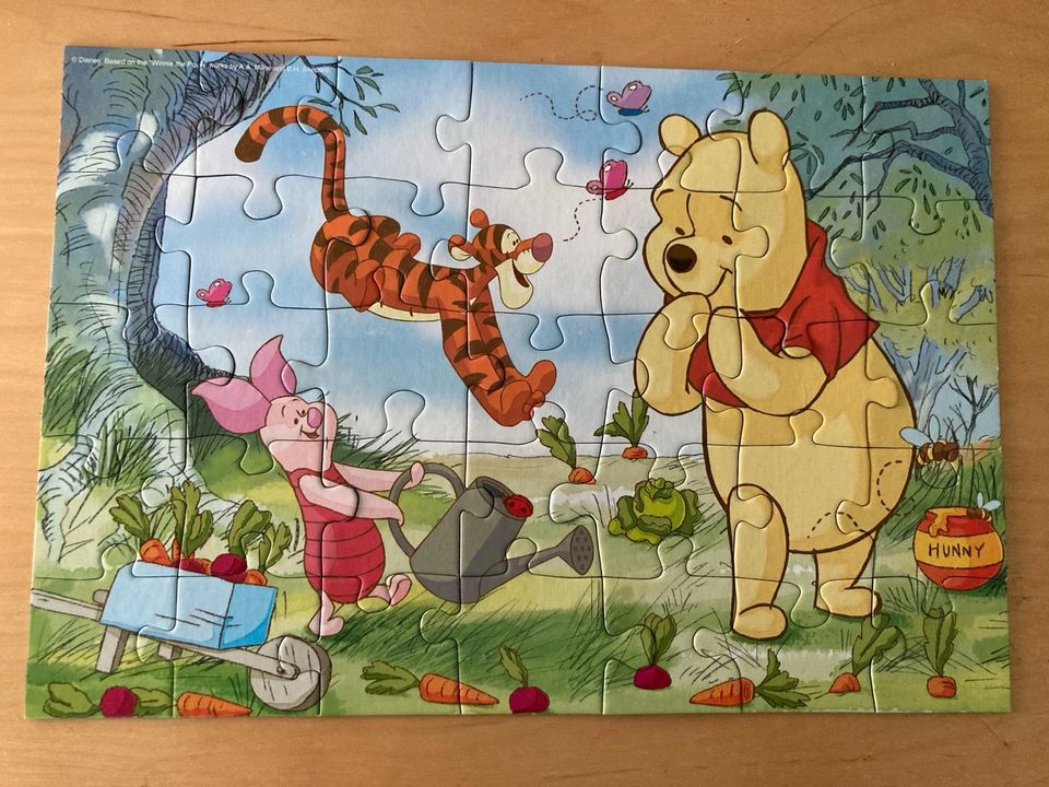 2 Puzzles Hello Kitty Winnie Puh vollständig in Eisenach