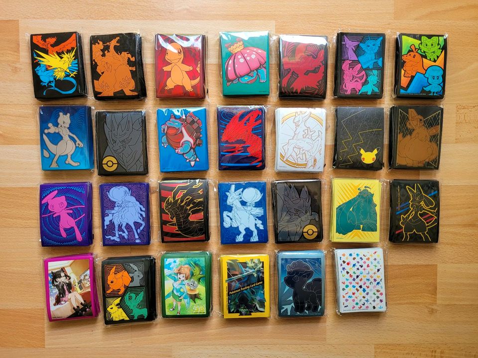 100 Pokemon Karten deutsch boosterfrisch + V ex Booster Holo Tin in Berlin