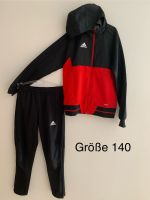 Trainingsanzug schwarz/rot von Adidas Größe 140 Niedersachsen - Bergen Vorschau