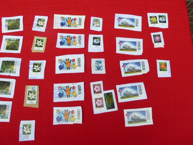 Briefmarken-Konvolut Sammlung 100 Stück, Marken gestempelt & nass in Flintbek