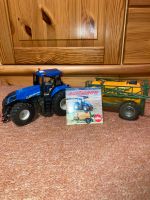 Siku 1:32 New Holland T8 mit Feldspritze Niedersachsen - Adelebsen Vorschau